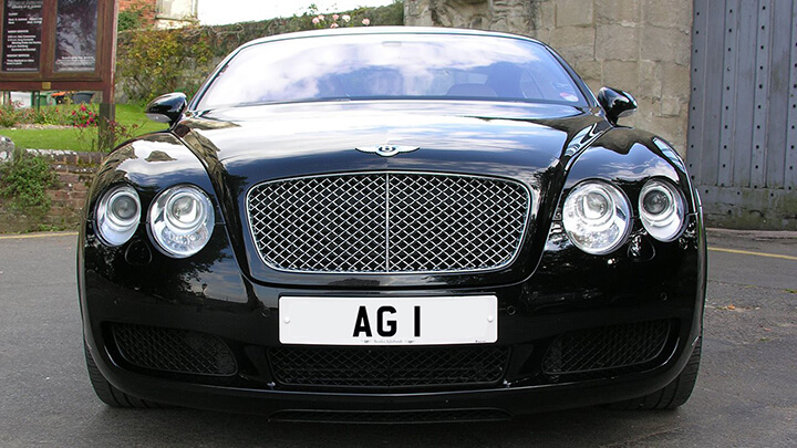 Car displaying the registration mark AG 1