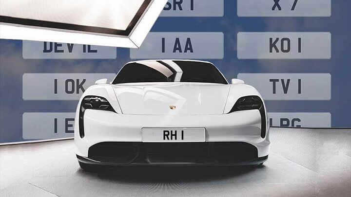 A white sportscar with the registration RH 1