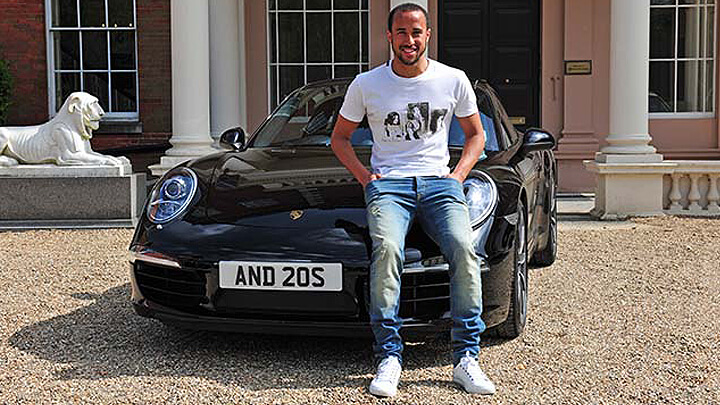 Andros Townsend with number plate AND 20S