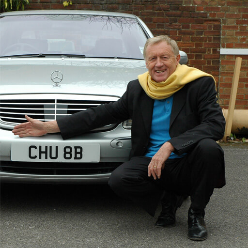 Chris Tarrant with number plate CHU 8B