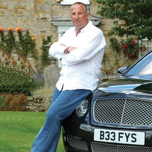 Ian Botham with number plate B33 FYS