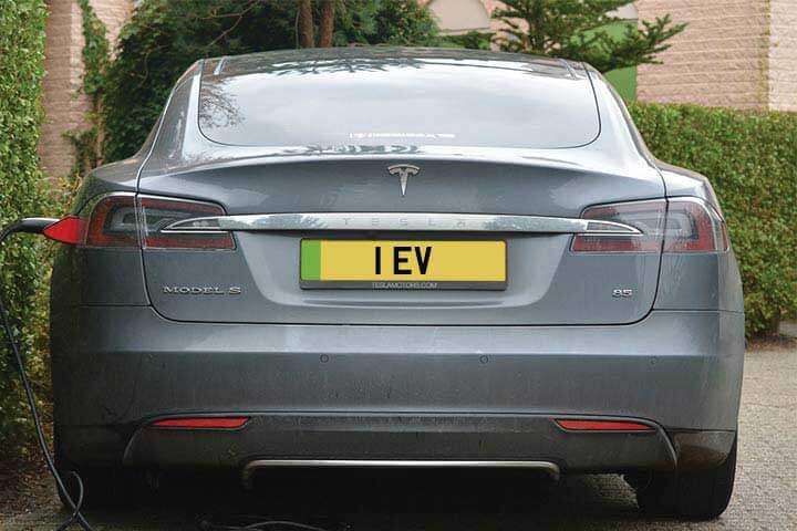 An electric vehicle number plate on a Tesla Model S