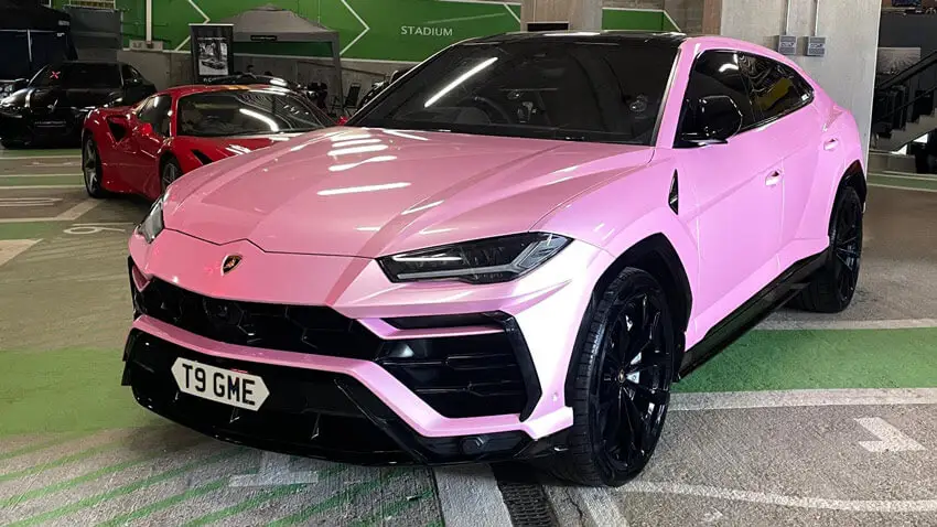 A Lamborghini Urus with registration t9gme